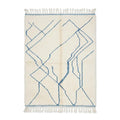 Tapis berbère Azilal blanc crème aux motifs géométriques lignes bleues en laine naturelle fait main