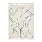 Tapis berbère Azilal blanc crème aux motifs géométriques lignes bleues en laine naturelle fait main