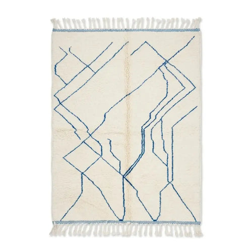 Tapis berbère Azilal blanc crème aux motifs géométriques lignes bleues en laine naturelle fait main