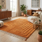 Tapis berbère orange dans un salon inspiré marocain, design authentique et atmosphère cosy élégante
