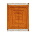 Tapis berbère orange terracotta en laine à relief géométrique et franges blanches