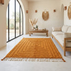 Tapis berbère orange dans un salon lumineux style bohème chic, ambiance chaleureuse et décoration naturelle