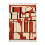 Tapis berbère Boujad authentique en laine motifs abstraits rouge terre de Sienne et noir